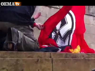 greek-protesters-try-to-burn-german-flag