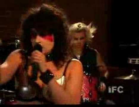 Youtube: peaches - henry rollins performance (hit it hard)