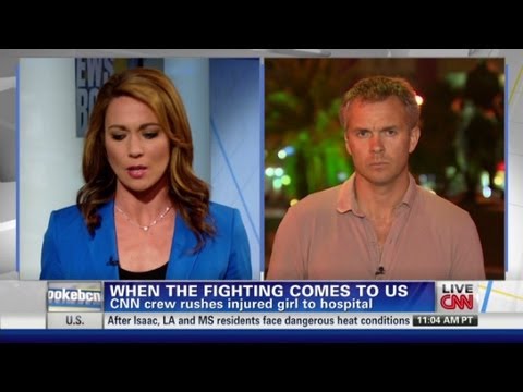 Youtube: CNN crew helps injured child in Syria