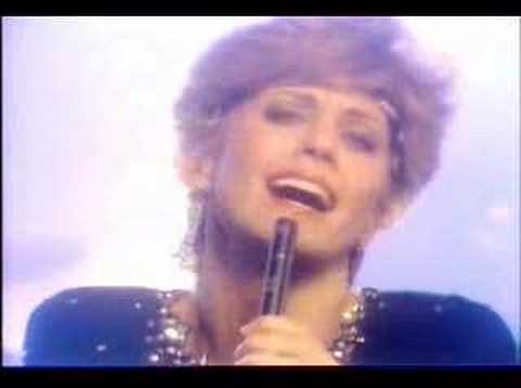 Youtube: Olivia Newton John - A Little More Love